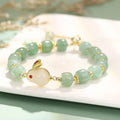 Women's casual rabbit bracelet with green aventurine natural stone beads and copper plated metal with 14k gold accents