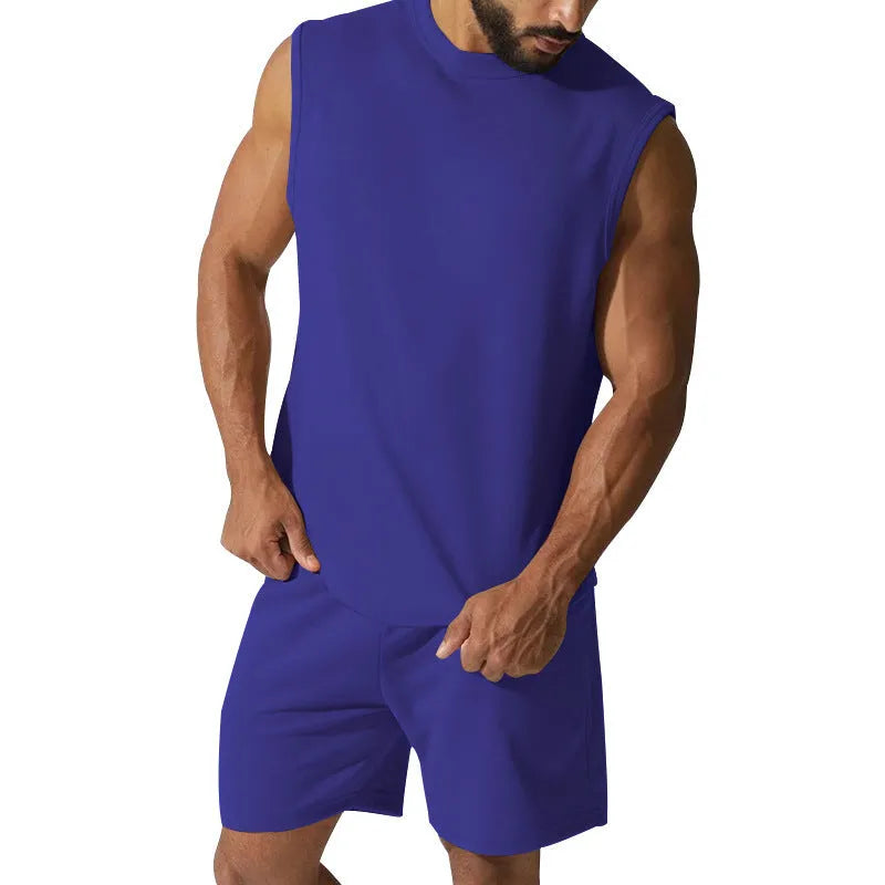 Men's sleeveless cotton blend sports top and shorts set in a solid colour on a mannequin.