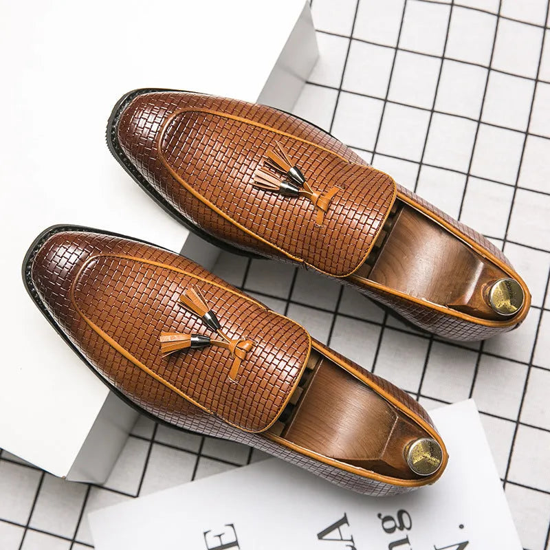 Men's black pointed toe slip on loafers with tassel detail on artificial PU leather upper