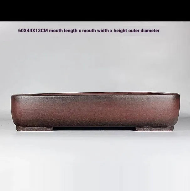 Handmade antique rectangular purple clay flower pot showing traditional finish and substantial size.