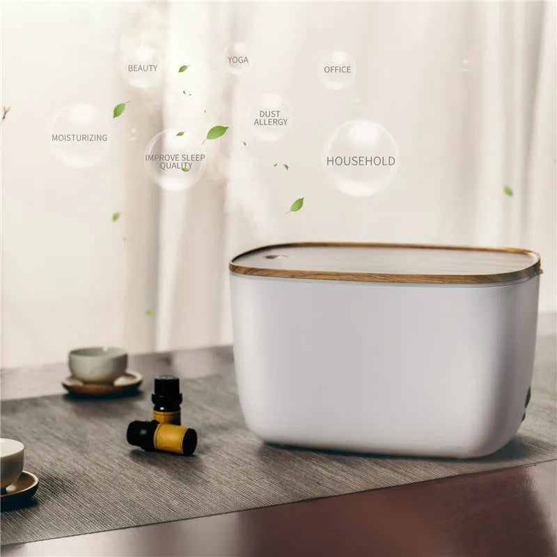 GX-22K household aromatherapy humidifier with night light on wooden surface