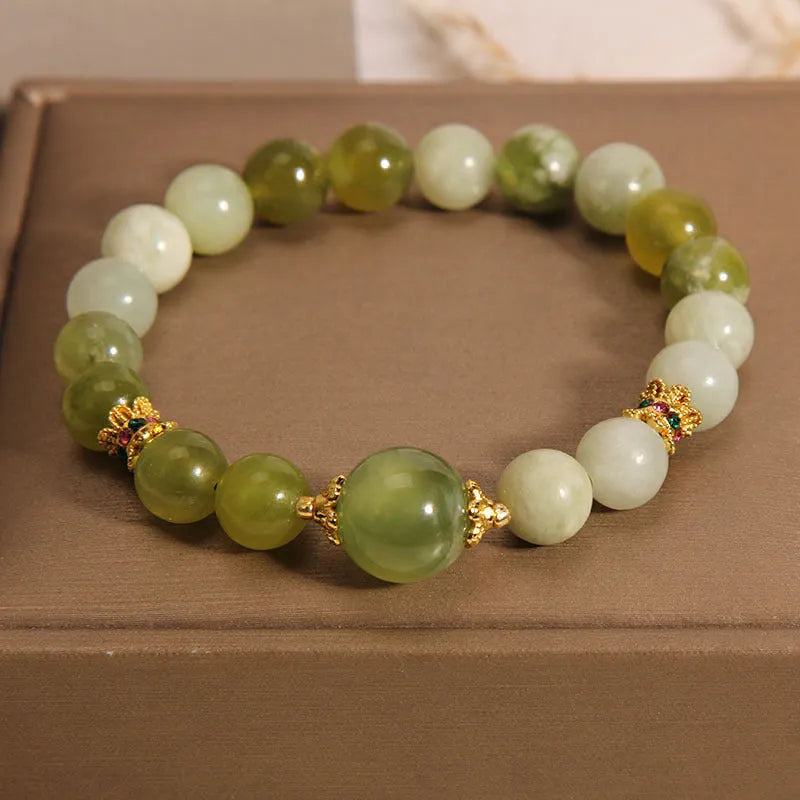 Women's jade green bracelet made from Xiuyan jade stone with adjustable cord