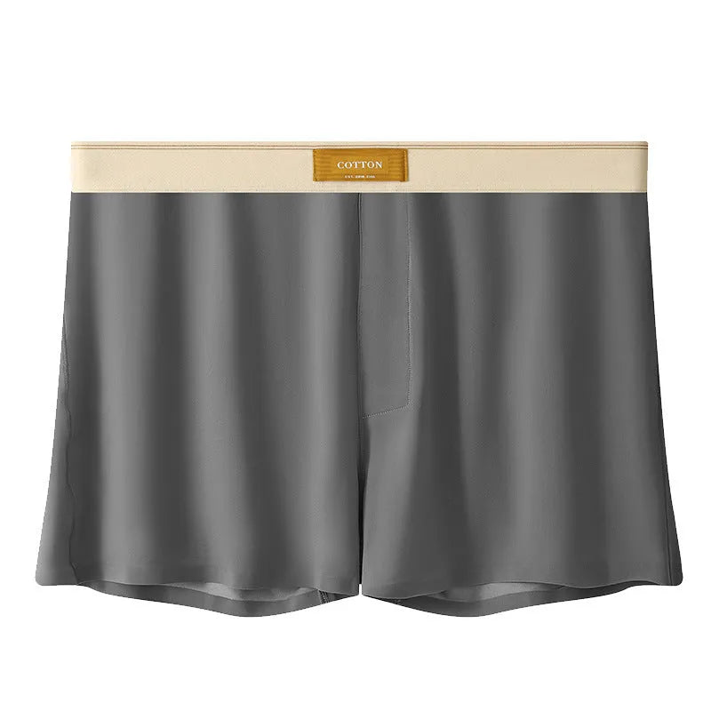Pack of three pairs of solid colour men's loose fit ice silk underwear on a white background.
