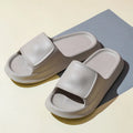 Soft EVA bathroom flip-flops with thick non-slip sole in multiple colour choices on a white background.