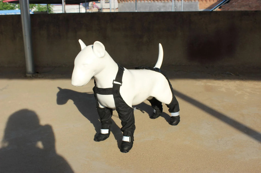 Black dog paw protectors with adjustable Velcro straps, waterproof non-slip soles