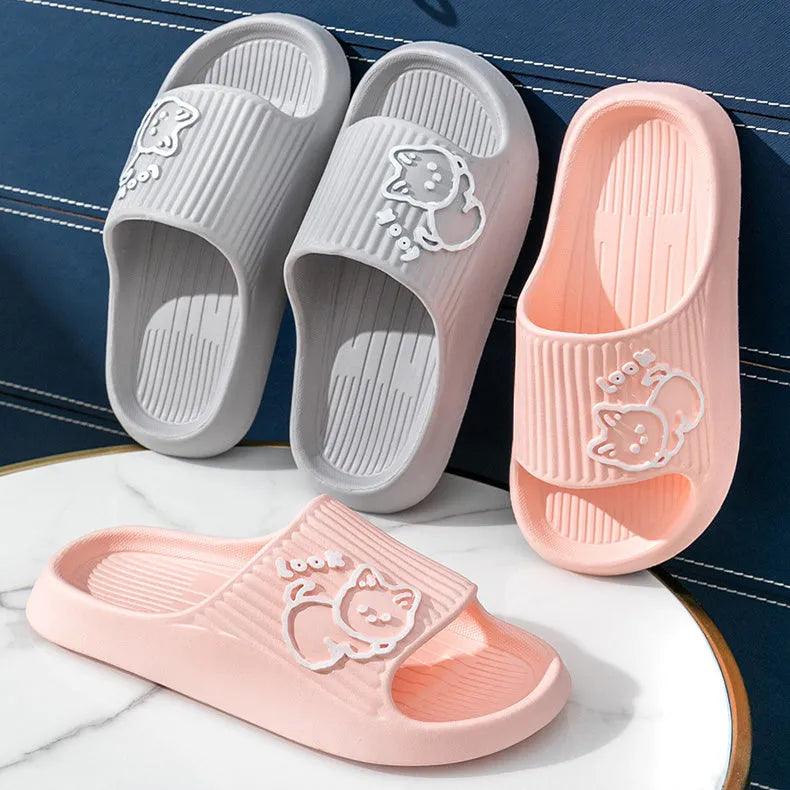 Women's green EVA flip-flop slippers with cute cat design and thick platform sole.