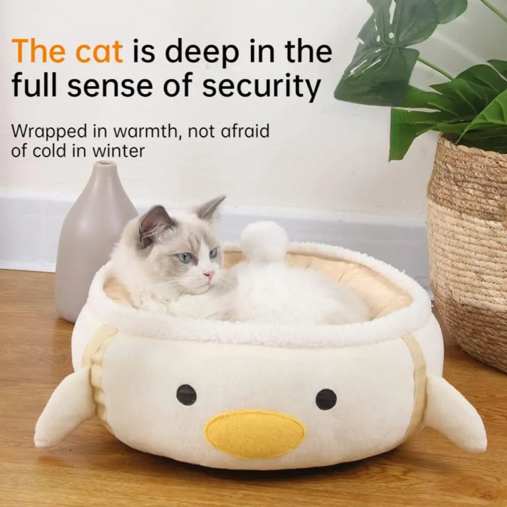 Green dinosaur and chick shaped cat bed shown both as a flat sofa and hanging as a hammock.