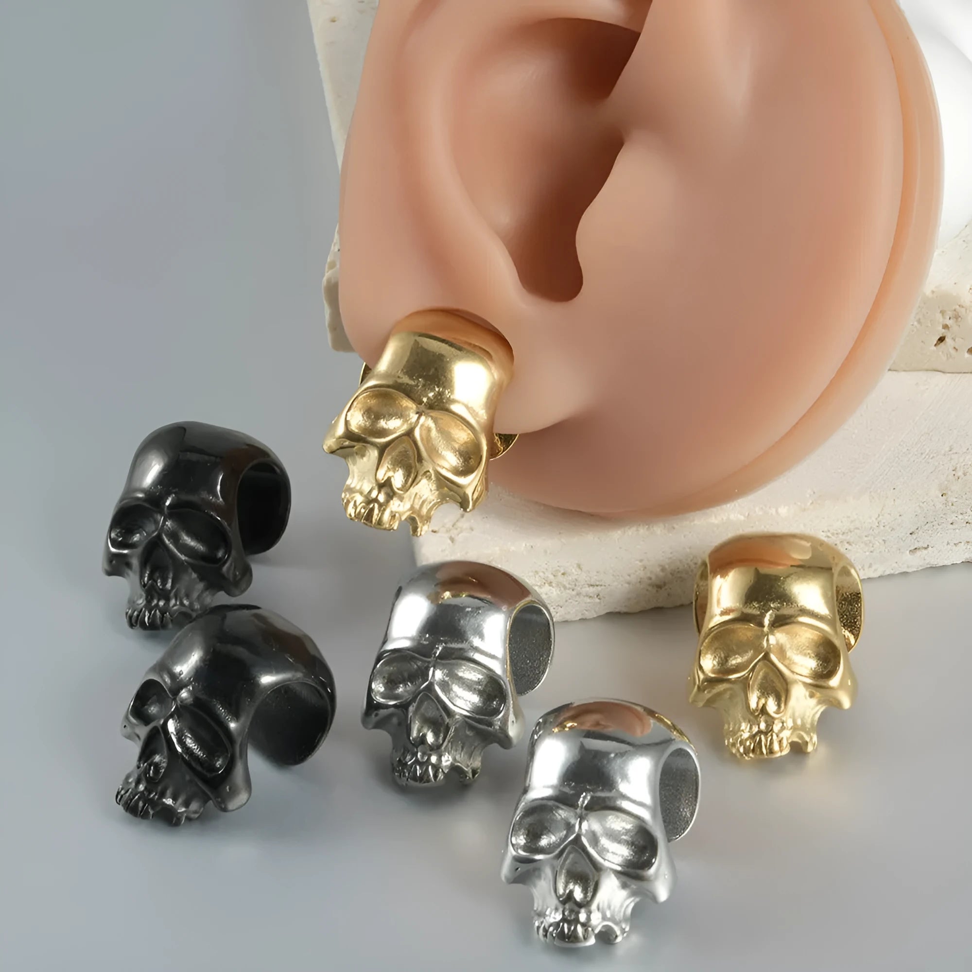 Stainless steel hollow skull Buddha geometric earrings in hip hop style with electroplated finish