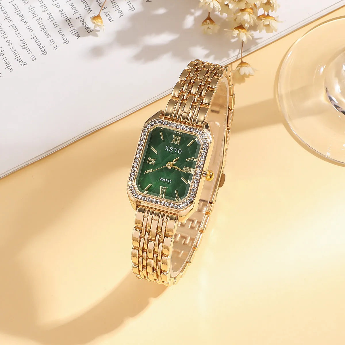 Gold green square watch and four matching bracelets showing alloy construction and jewellery buckles
