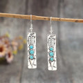 Silver geometric earrings with turquoise inlay on long strip zinc alloy retro design