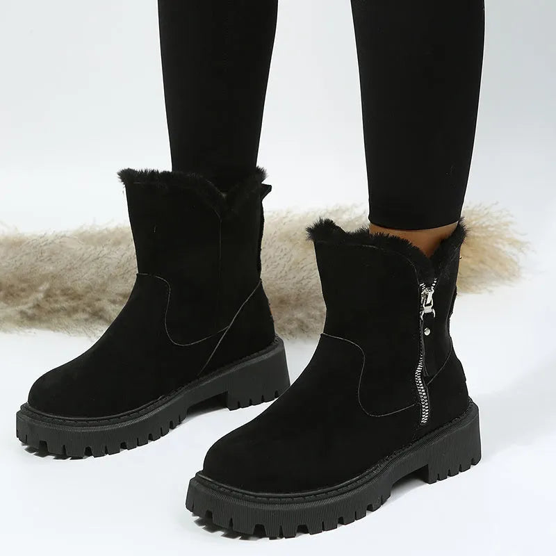 Women's black thick plush snow boots with faux suede upper, side zip, and non-slip rubber sole.