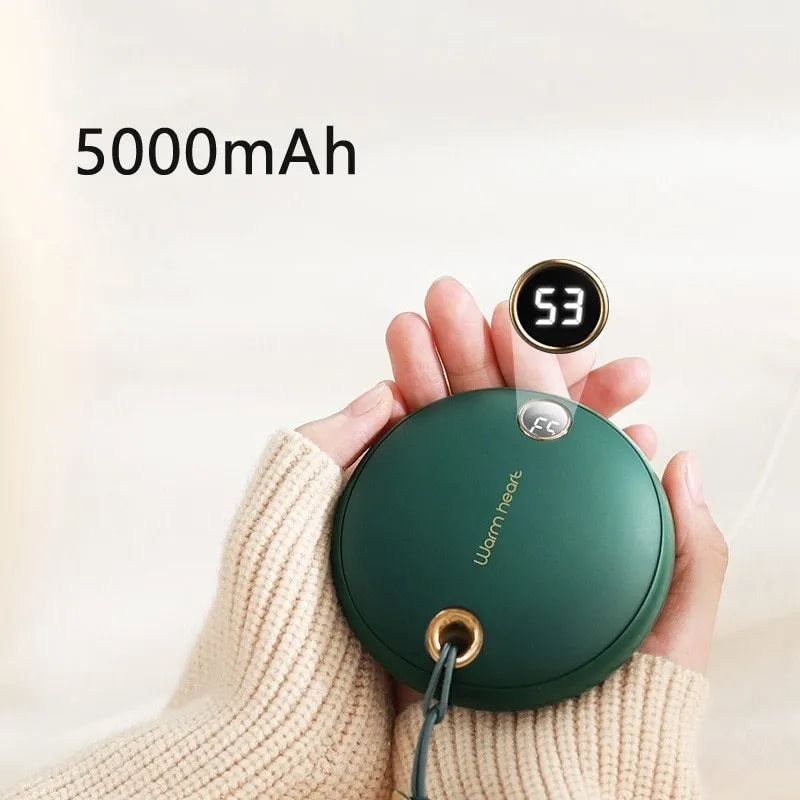 Green portable power bank with hand warmer function showing digital display and Type-C port