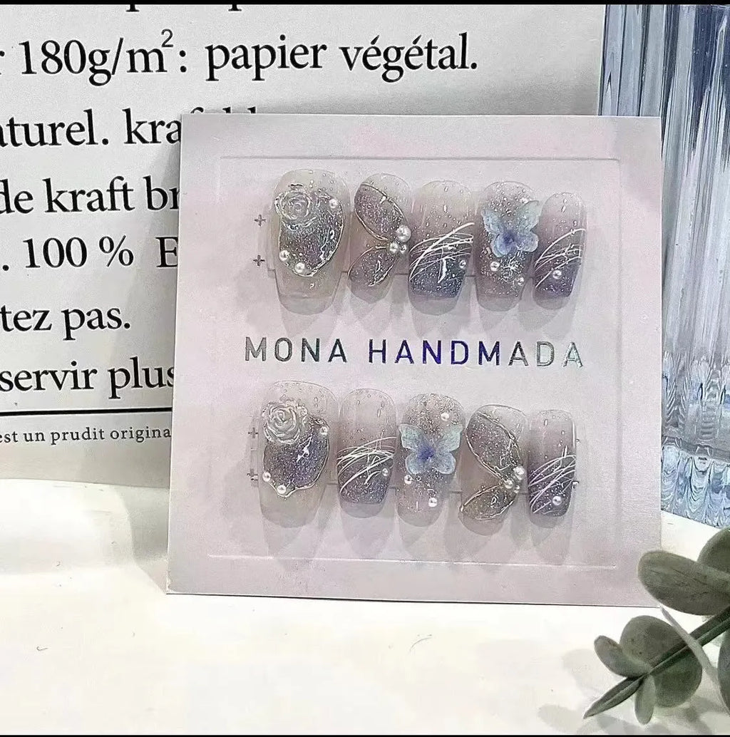 Hand-wearing bridal fake nails sequins set in four sizes with glue and tools for nail art