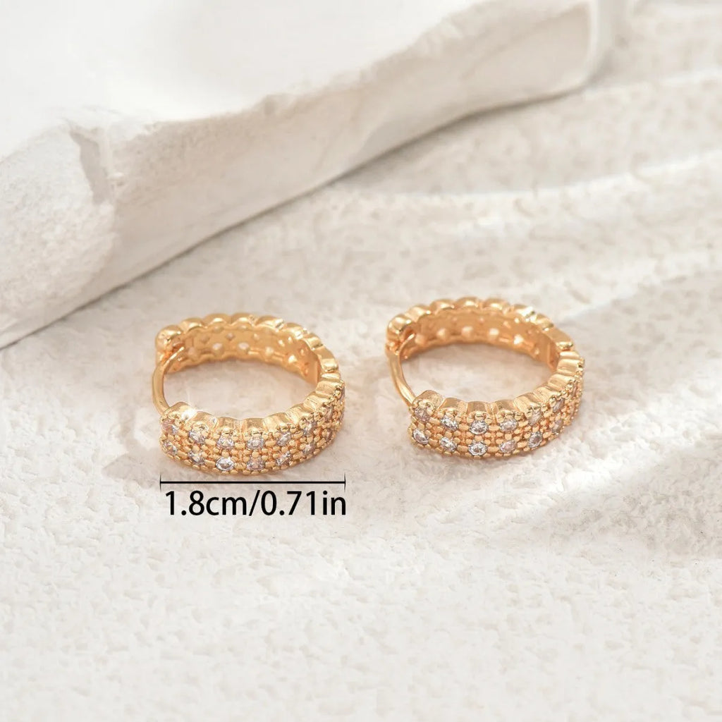 Copper geometric ear studs with circular dot and ring patterns in European American style