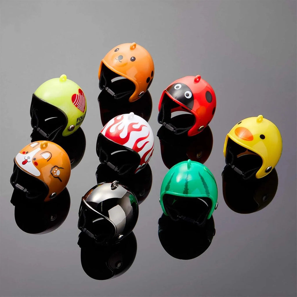 Adjustable hard plastic chicken helmet with sponge lining, elastic bands, and colourful options for small birds and poultry.