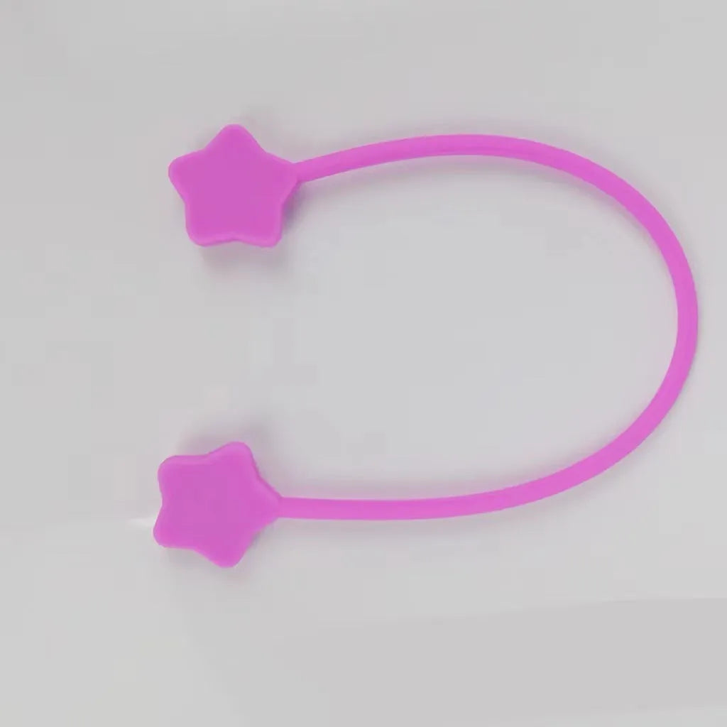 Silicone wire winder with magnet in lavender colour for organising headphone and mobile phone cables.