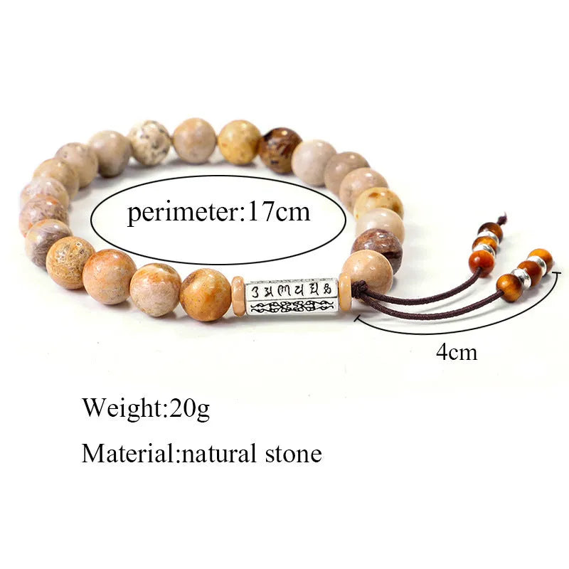 Handmade wood-colour stone bracelet with retro design on a wrist.