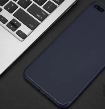 Flexible black TPU silicone case for iPhone on a table