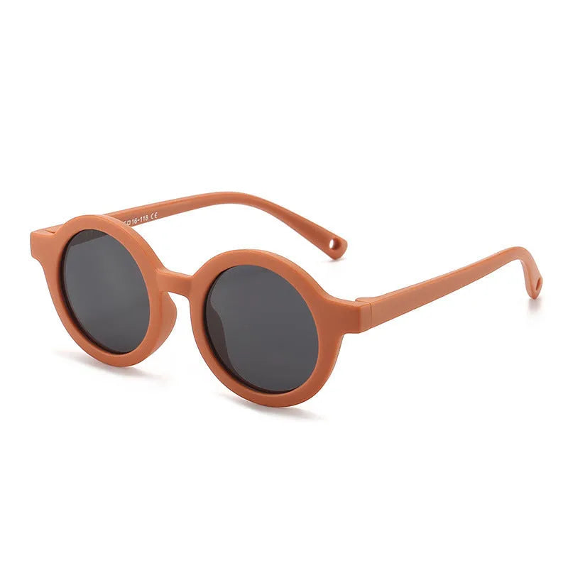 Round frame polarised sunglasses for toddlers aged 0-3 years with UV400 protection, shown in multiple colour options.