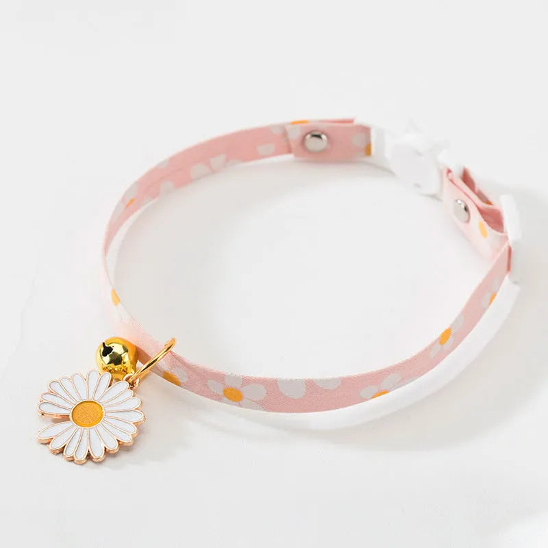 Adjustable cat collar with bell pendant and bow tie accessory in green, pink, or yellow colours