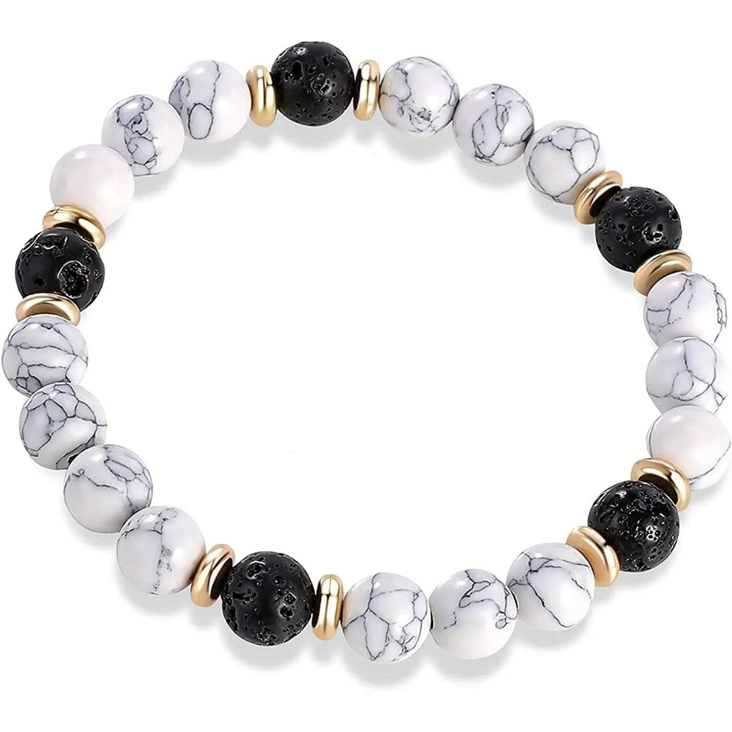 Natural stone bracelet with alloy volcano white turquoise centrepiece and mixed tiger eye beads on white background