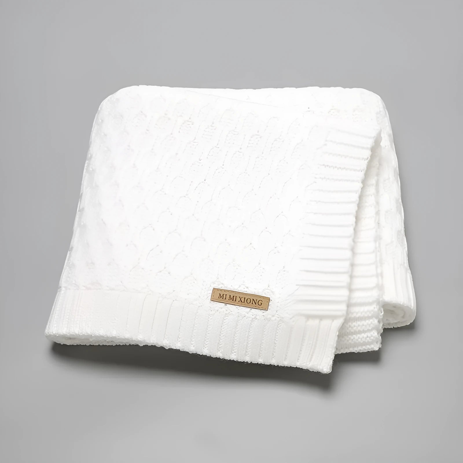 Solid colour infant hug blanket with three-dimensional lines texture in 70×90cm size