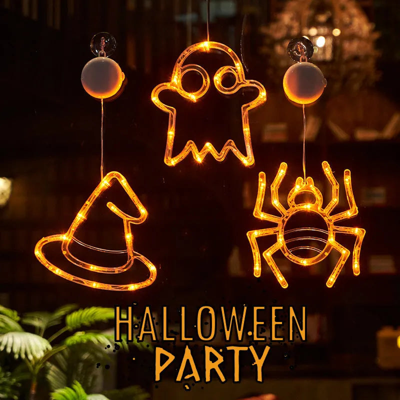 Halloween window hanging LED lights set with spider and pumpkin designs using suction cup installation