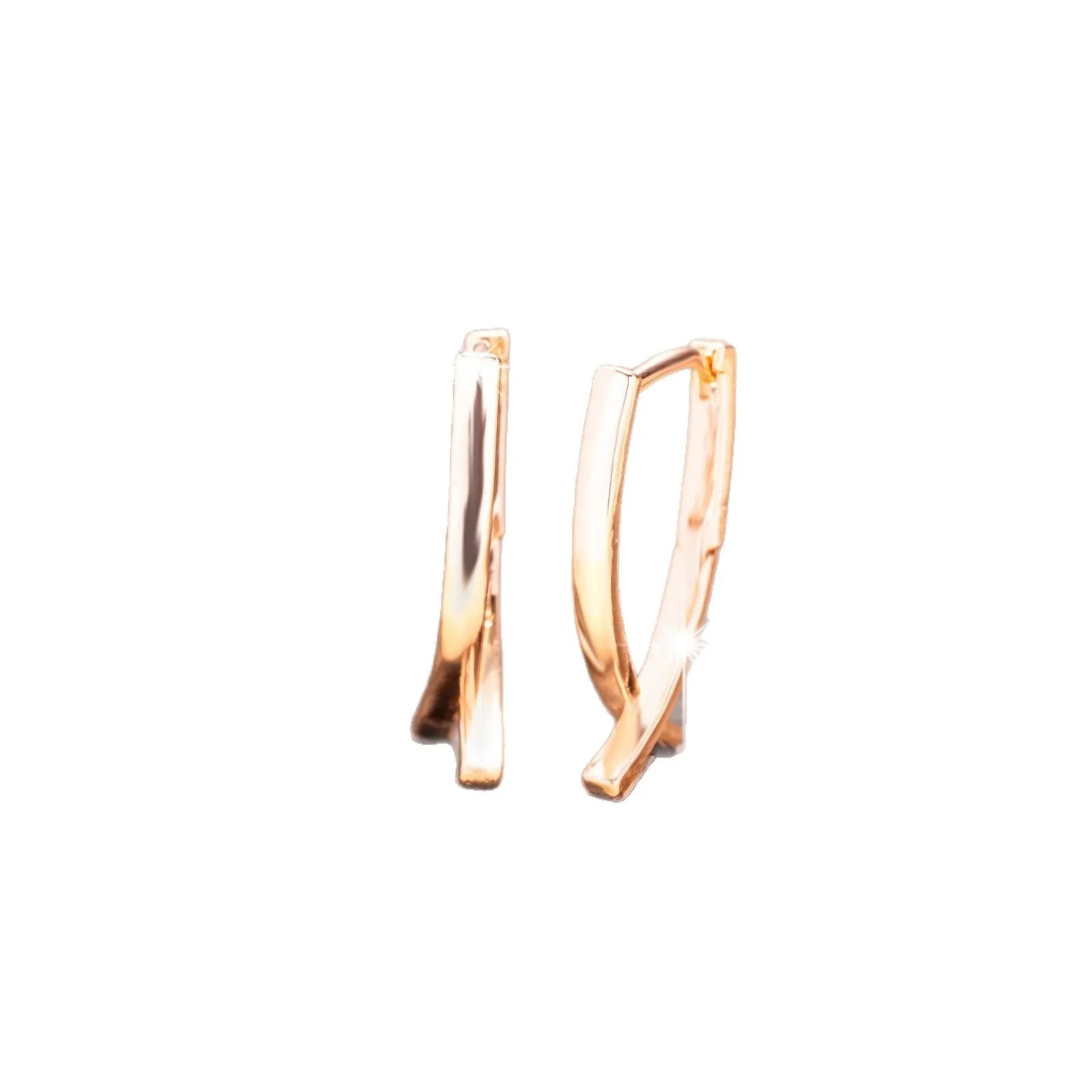 Rose gold plated copper cross shaped earrings with light luxury design