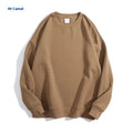 Women's loose round neck off shoulder cotton sweater in a mint green colour, long sleeves.