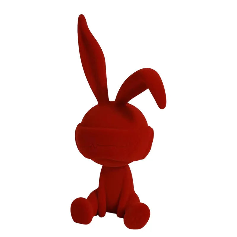 Resin rabbit ornament with suede blindfold in blue, green, or red colour options