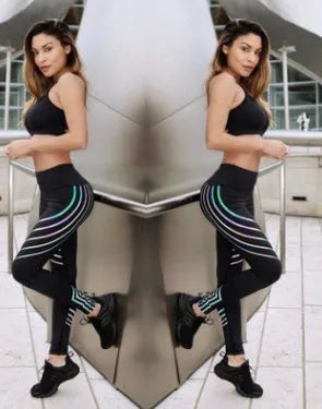 Women's black workout leggings with glow in the dark print pattern for fitness activities