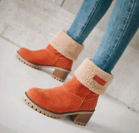 Women's mid-calf suede snow boots in various colours with a thick flat heel and round toe.