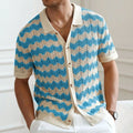 Yellow, blue, and brown short-sleeve sweater with hollow jacquard corrugated texture and flocking detail.