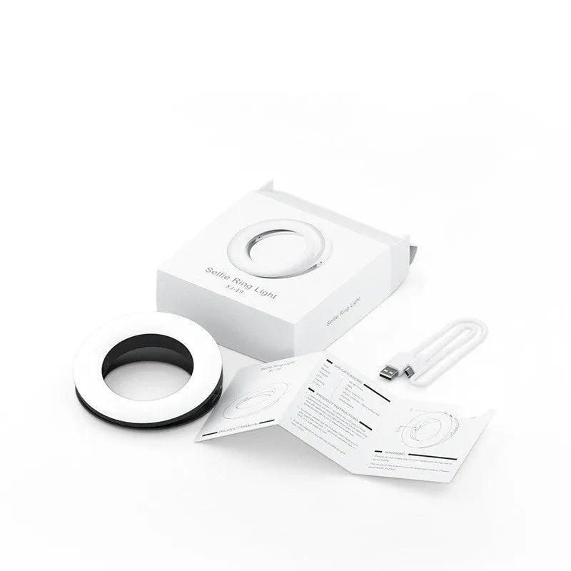 Compact black LED ring light for mobile phone photography with USB charging cable