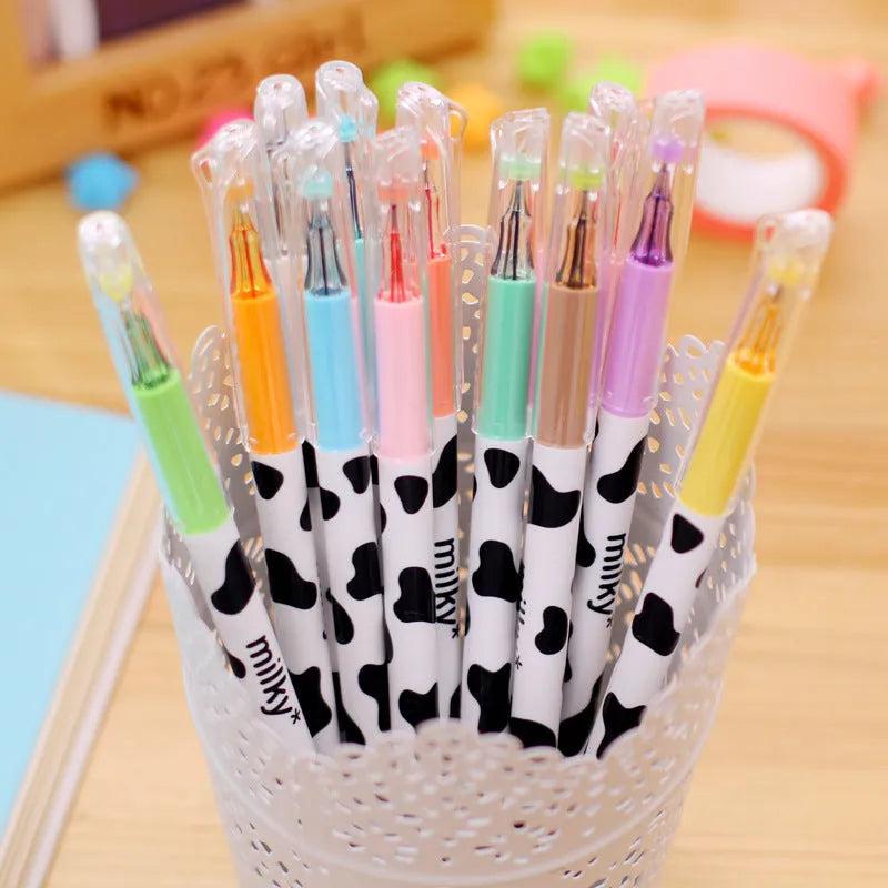 Box of 12 assorted colour gel pens with 0.38mm fine tips and plastic cow design shells