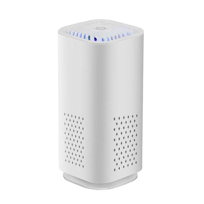 Compact black and white mini USB car air purifier with filter for small spaces.