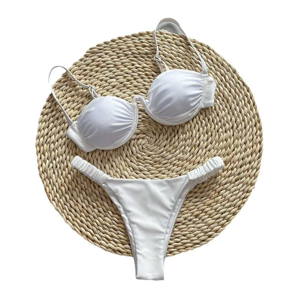 Women's black underwire bikini swimsuit with brief bottoms on a mannequin.