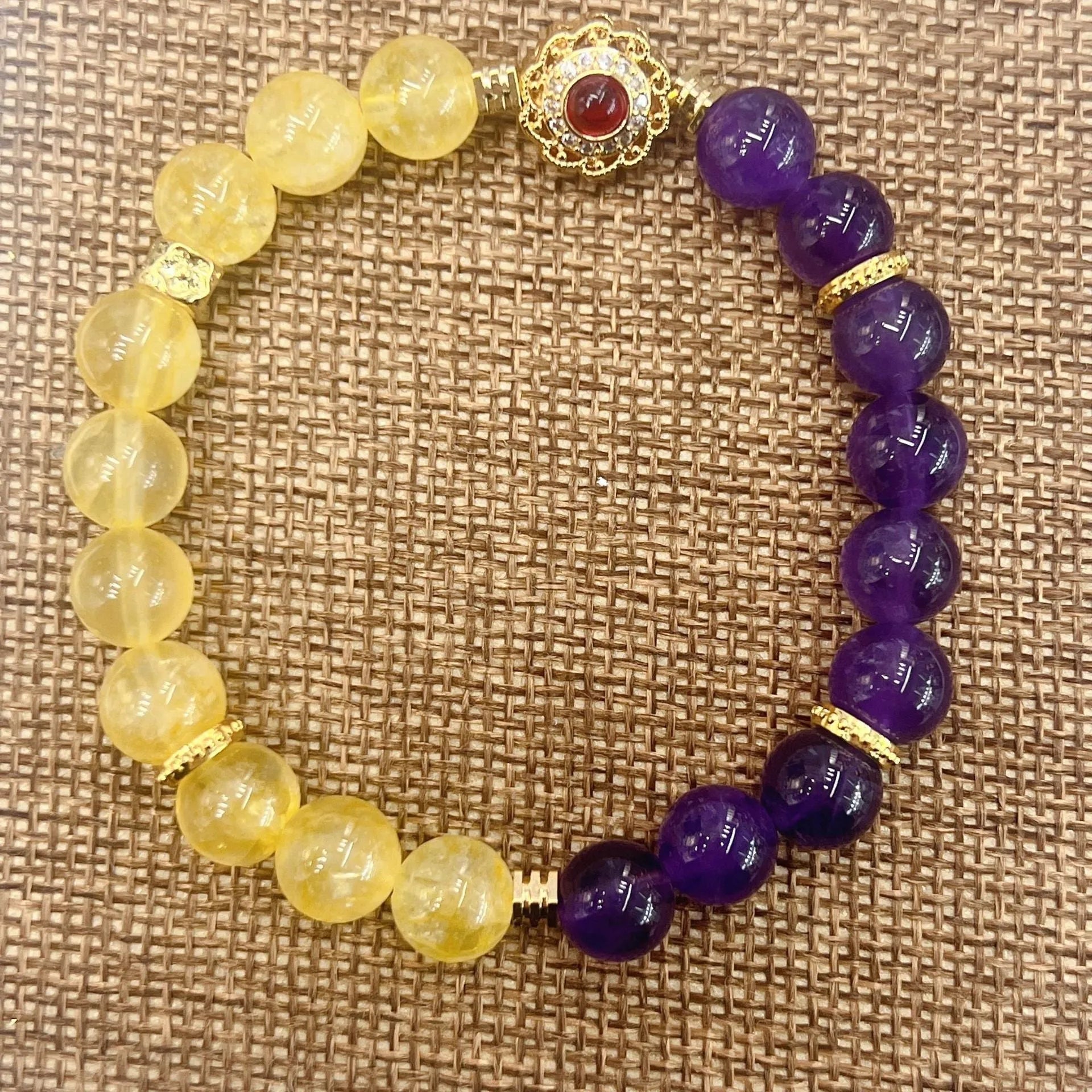 Handmade yellow and purple crystal amethyst bracelet for women showing artisan craftsmanship