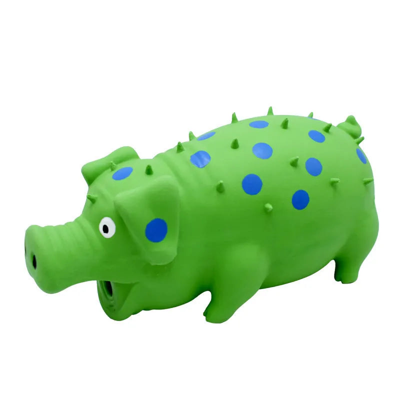 Pig-shaped latex dog chew toy with textured surface and squeaker