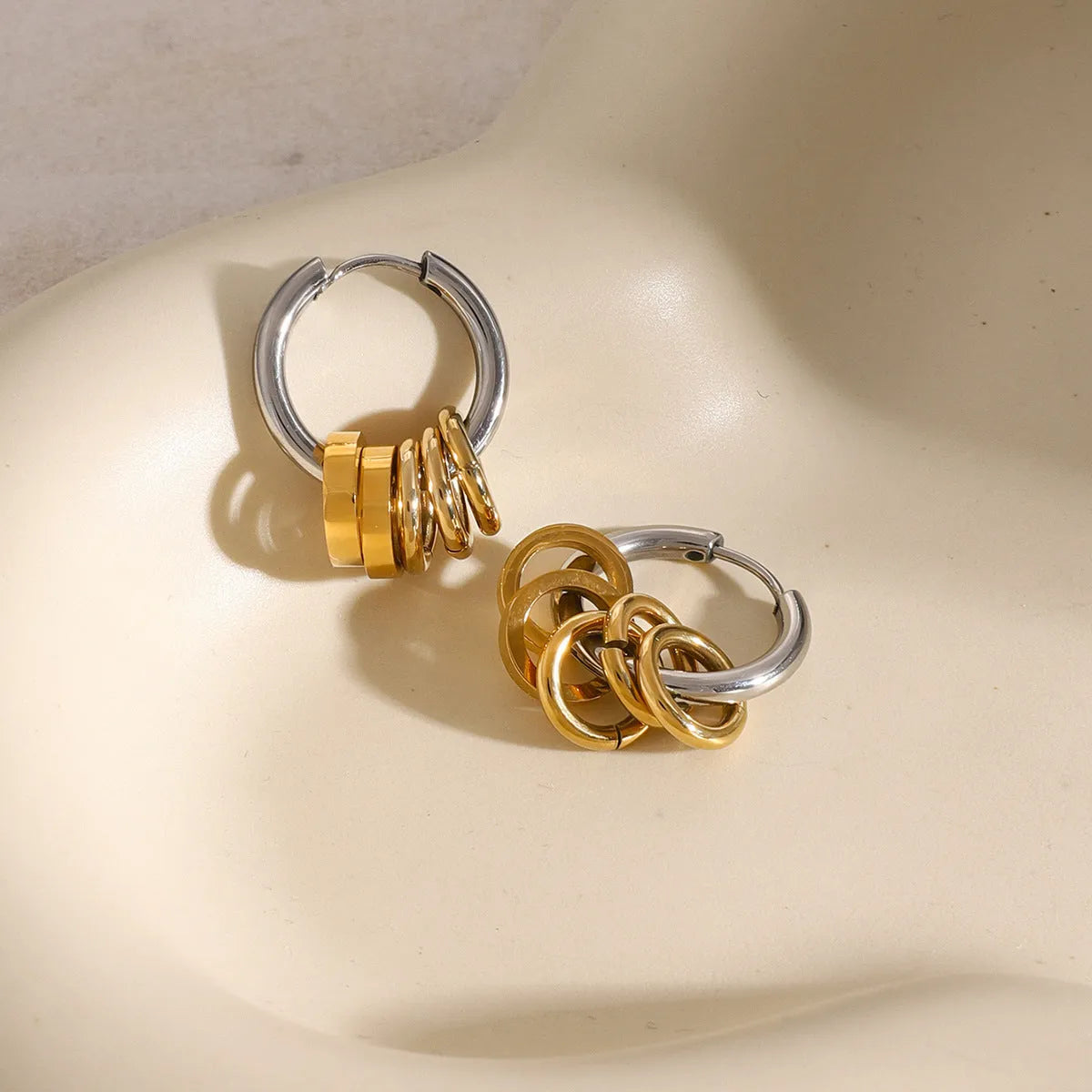 Stainless steel electroplated earrings with colour-matching finish for unisex piercing jewellery