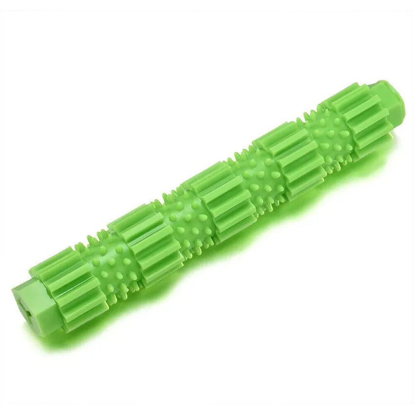 Green and orange rubber dog chew toy with treat dispensing opening and textured surface for aggressive chewers