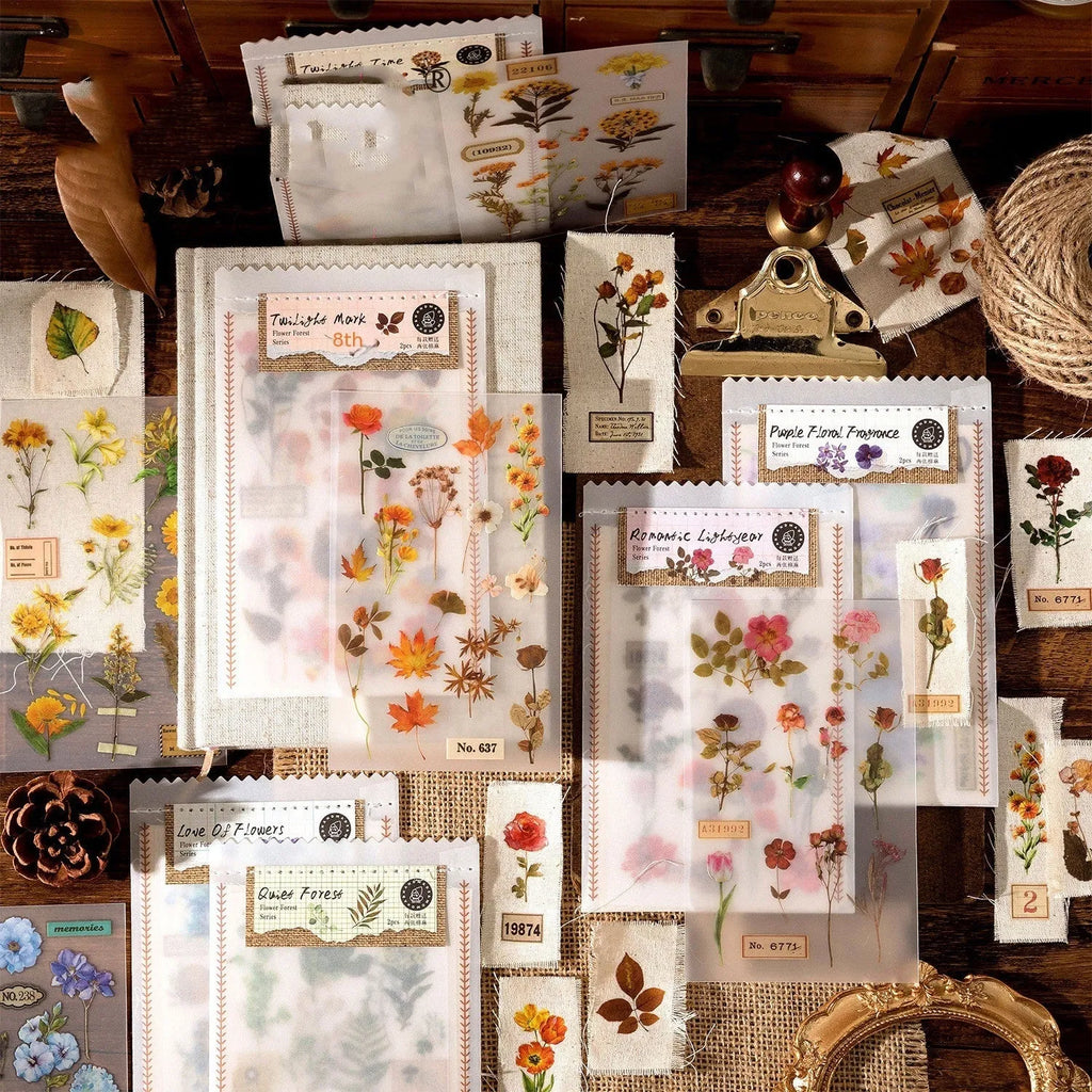 Huazhisen Series sticker material pack showing transfer paper and cotton linen sheets with forest and floral designs