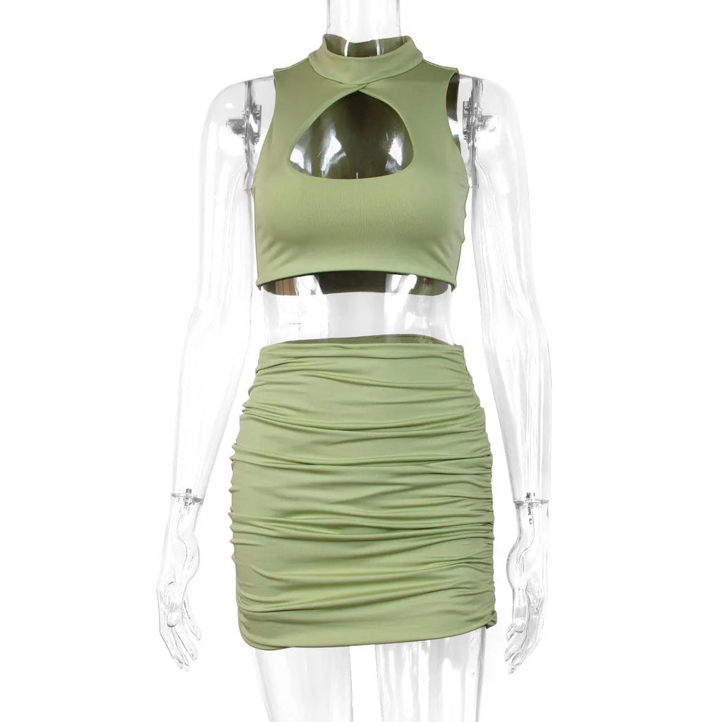 Light purple women's hollow vest and split skirt two-piece summer outfit set.