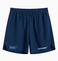 Men's grey fitness training shorts with four-point design on a gym floor