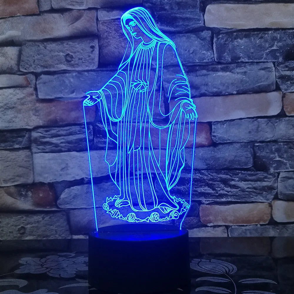 3D LED kids night light with colourful ring pattern, USB cable, and touch-sensitive base on a table.