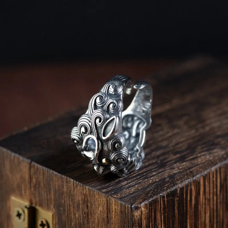 Silver open ring with detailed Jibeast animal zodiac pattern modelling in a retro style.