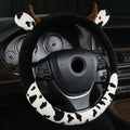 Short plush steering wheel cover for cars in black colour showing textured surface