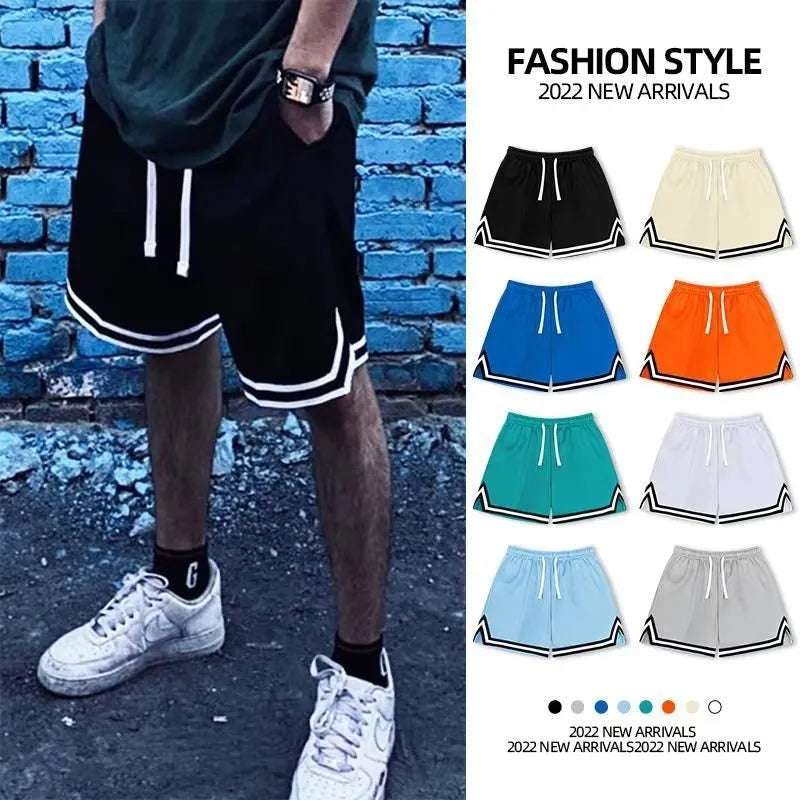 Men's loose fit polyester sports shorts in multiple colours with an elastic waistband.