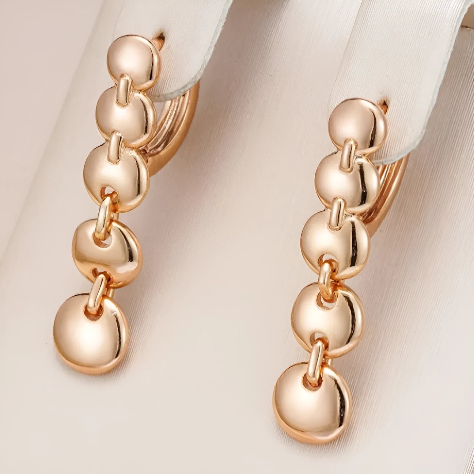 Retro long round circle earrings with woven copper construction and gold finish