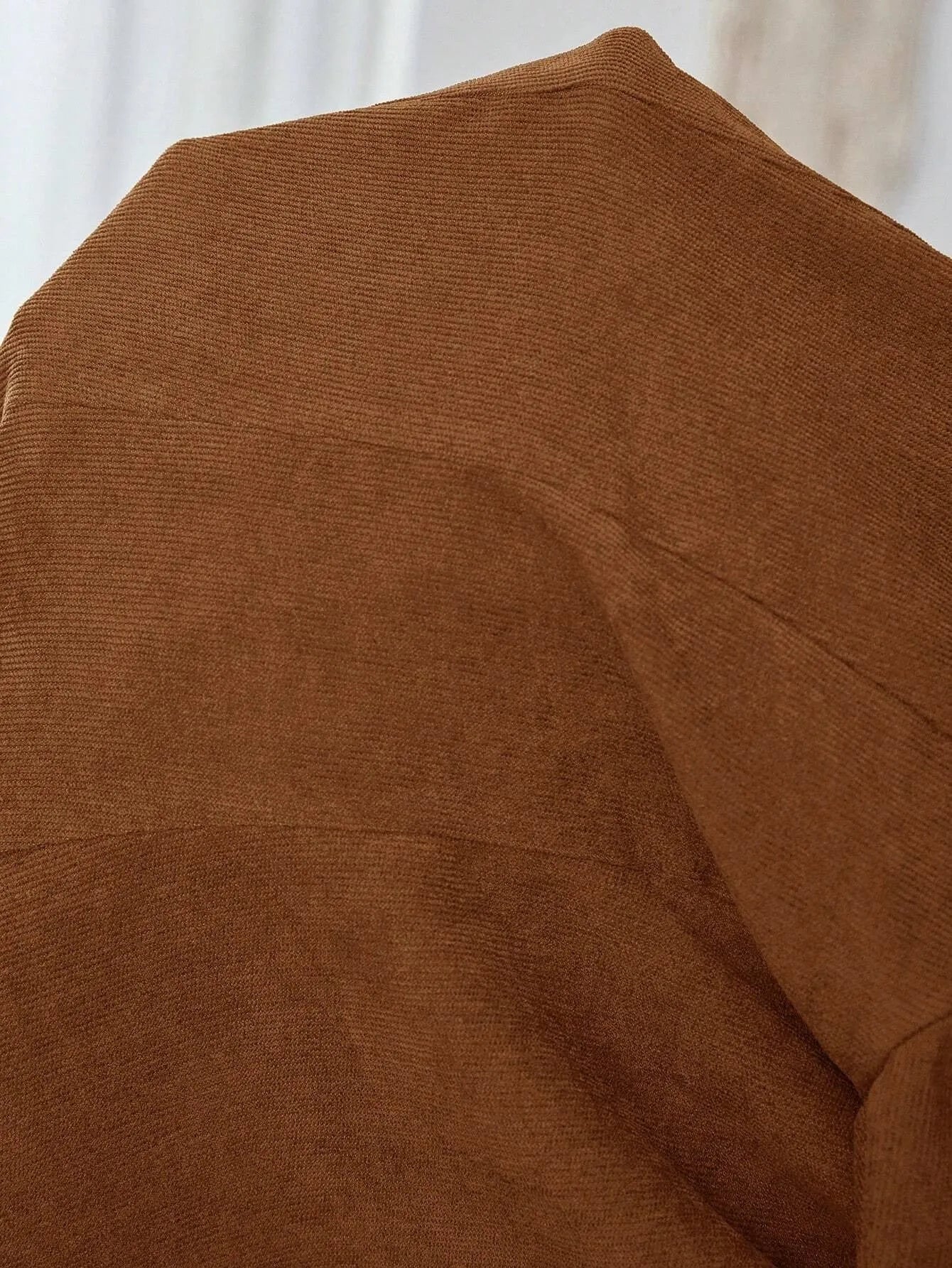 Brown men's lapel single-breasted coat with long sleeves shown in multiple size options